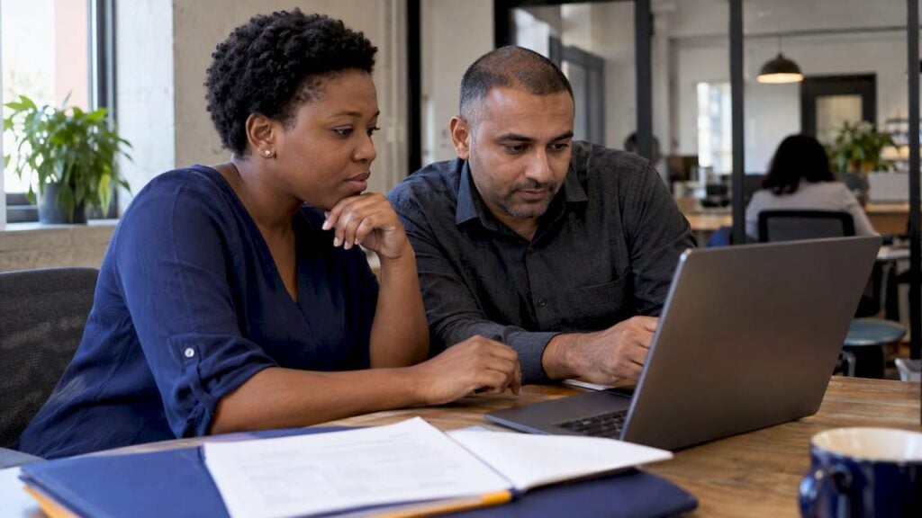 Diverse owners reviewing overseas provider terms